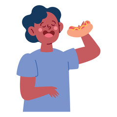 young man eating hot dog