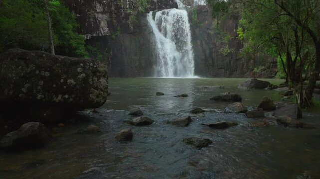 Cedar Creek Falls Waterfalls aerial drone Australia Whitsundays Airlie Beach Proserpine Palm Grove QLD Queensland Rainy wet season spring summer autumn winter sunny cloudy swim  forward pan up motion