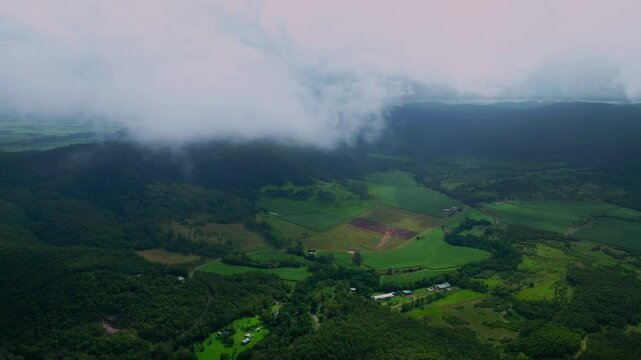 Cedar Creek Falls farmland aerial drone Australia outback Aussie green forest Whitsundays Airlie Beach Proserpine Palm Grove QLD Queensland spring summer autumn winter sunny cloudy rain upward motion