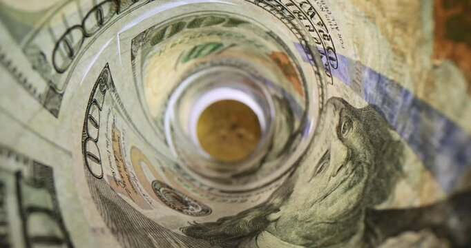 Dollar banknotes twisted in roll demonstrate wealth concept