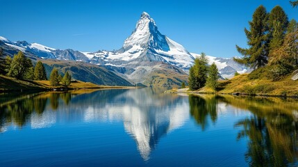 Naklejka premium A breathtaking scene capturing the reflection of a mountain peak on a tranquil lake, showcasing nature's beauty and serenity.