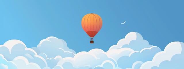 Fototapeta premium A clear blue sky with a single hot air balloon floating peacefully.