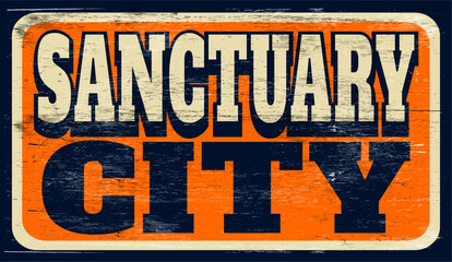 Fototapeta premium Aged and worn sanctuary sign on wood