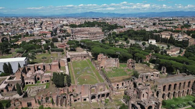 Rome , Italy - may 2 2024 Drone Shot flying away from Palatine Hill, Ancient Roman Colosseum