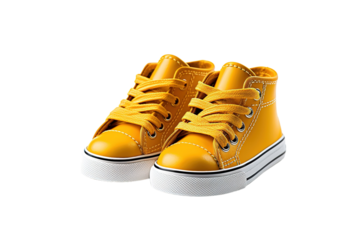 A Pair of Yellow Canvas Sneakers With White Laces Tied in a Classic Bow on a Clear PNG or White Background.