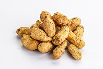 Raw ripe unpeeled peanut heap