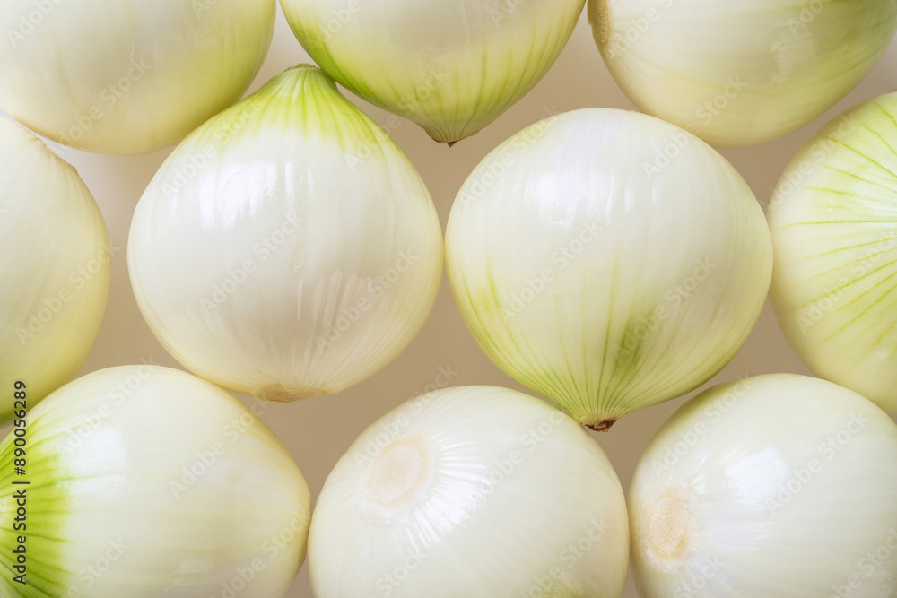 Sticker Close up and top angle view of peeled raw onions on white floor, South Korea
