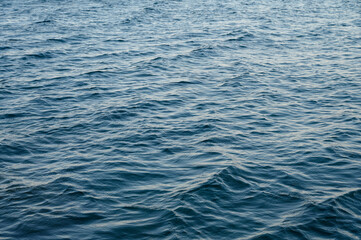 Water ripple over sandy beach
