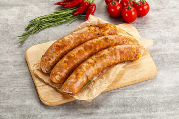 Raw sausages with spices and herbs