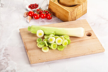 Ripe sliced leek over board