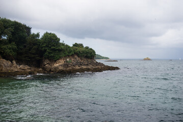 skyline of the bay of Douarnenez on cloudy sky background