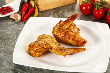 Tasty roasted chicken wing with spices