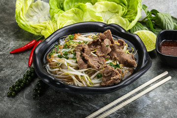 Vietnamese traditional soup Pho Bo with beef
