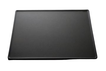 A Black, Textured Cutting Mat Ready for Culinary Creations on a Clear PNG or White Background.