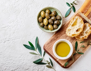 Olive Oil and Fresh Bread Branch on Marble Background