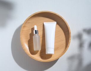 Naklejka premium cosmetic fashion cream lotion liquid bottle tube product packaging and long shadow on white 6.jpg