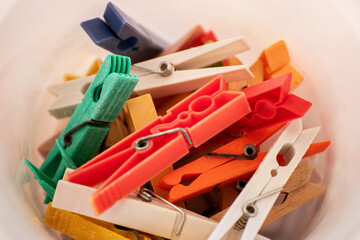 Colorful clothes pegs in a cheerful laundry setting.
