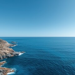 Coastal view with rocky cliffs and clear blue water