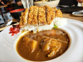 Chicken curry and fried pork Japanese food