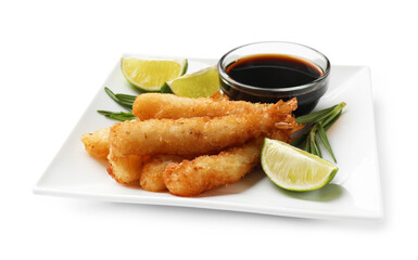 Delicious breaded fried shrimps with sauce and lime isolated on white
