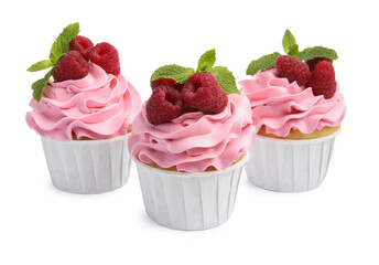 Tasty cupcakes with raspberries and mint isolated on white