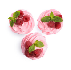 Tasty cupcakes with raspberries and mint isolated on white, top view