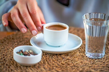 Savoring Tradition: Turkish Coffee with Water and Pebble Chocolate