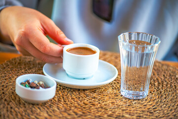 Savoring Tradition: Turkish Coffee with Water and Pebble Chocolate