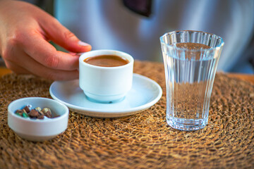 Savoring Tradition: Turkish Coffee with Water and Pebble Chocolate