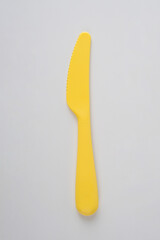 Yellow knife isolated on white background.  
