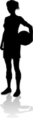 A female soccer football player woman in silhouettes