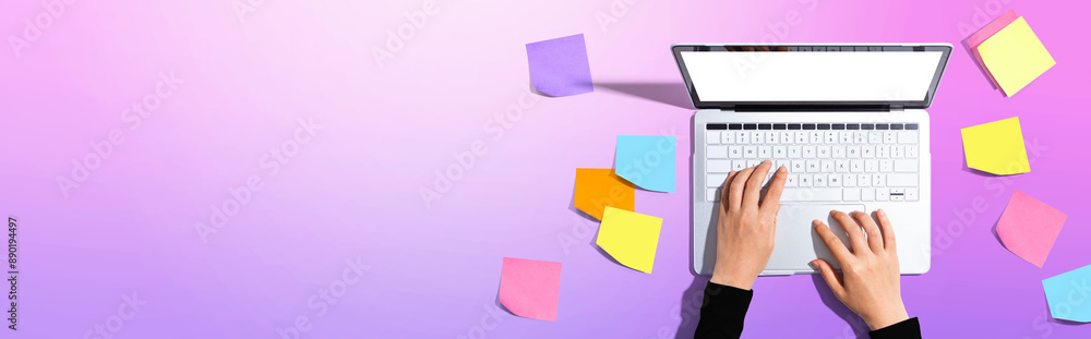 Poster laptop computer with many sticky notes - flat lay