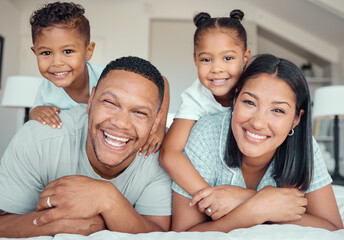 Fototapeta premium Happy family, portrait and piggyback kids in bedroom for connection, support and laugh together in home. Face, father and mother with children for love, care or parents relax with siblings in house