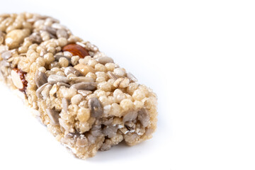 Healthy Muesli bar with nuts and seeds isolated on white background. Copy space