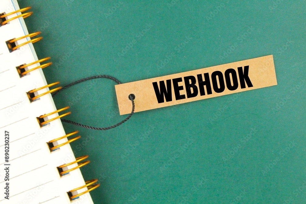 Fototapete book and tag paper with the word webhook. http request, triggered by an event in a source system