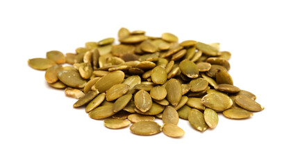 Hulled pumpkin seeds isolated on white background
