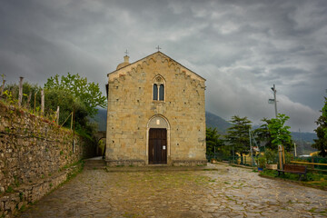 Church of Volastra  with cloudy sky, Liguria, Italy