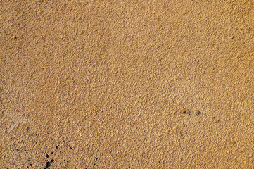decorative plaster on an old house wall at sunset