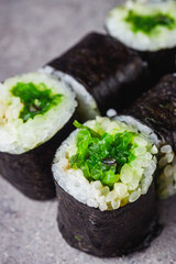 delicious fresh maki sushi roll with chuka salad