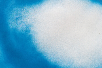 スプレー塗料で塗られた青色の背景