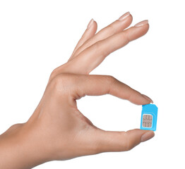 Woman with SIM card on white background, closeup