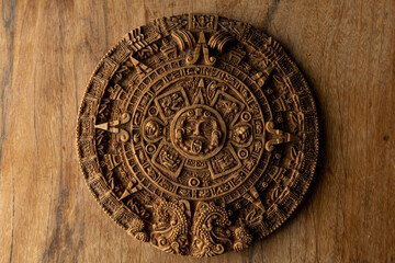 Mayan calendar on a wooden table