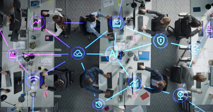 Top Down View of Employees Working in Office, Utilizing Artificial Intelligence Productivity Tools. Holographic Interface Icons Visualize Interaction and Advanced Tech Integration Within the Team - Powered by Adobe