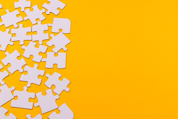 Fototapeta premium Scattered puzzle pieces