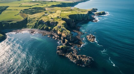 Capture the contrast between land and sea with an aerial view of a dramatic coastline.