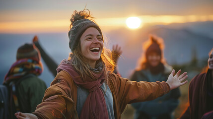 A young woman joyfully leads a laughter yoga session on a mountaintop at sunrise, her laughter echoing in the crisp air