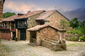 Plaza de Bárcena Mayor, Cantabria, Spain, where the fountain and water trough are located, a complex declared of historical-artistic interest