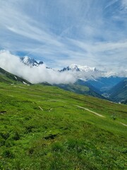 Picturesque view of the Mont Blanc mountain and glacier while hiking Tour du Mont Blanc. Popular tourist attraction. Alps, Chamonix-Mont-Blanc, France, Europe.
