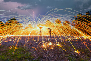 Long exposure night photography with steel wool effects.