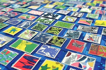 Vintage inspired stamps with botanical illustrations and muted colors capturing timeless elegance